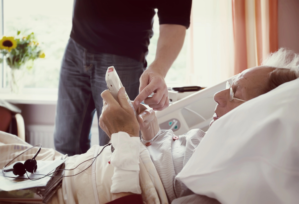An emergency care management professional advocating for a client in the ER