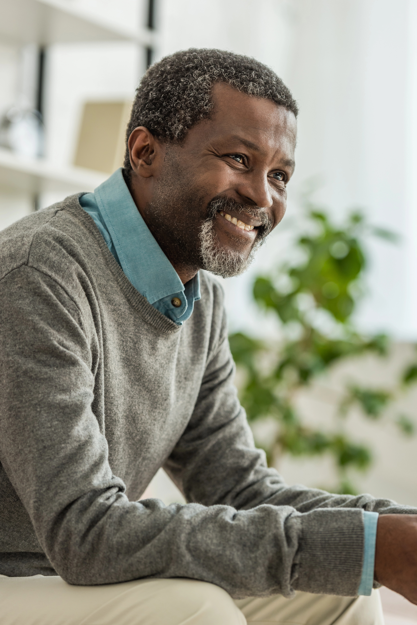 Smiling senior man happy about his crisis and emergency care management team