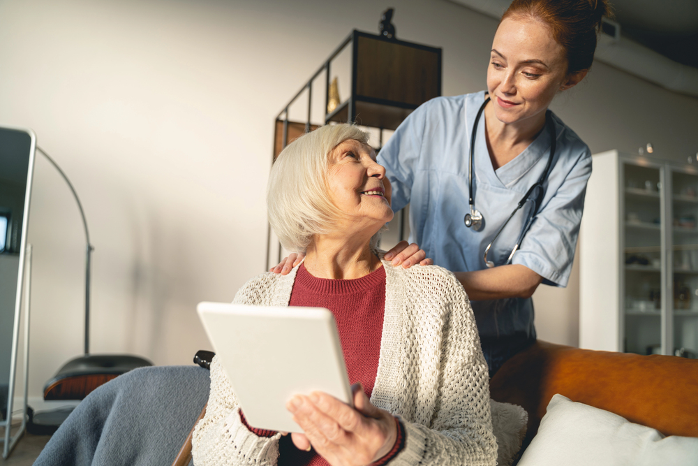 Older woman with a care manager at home