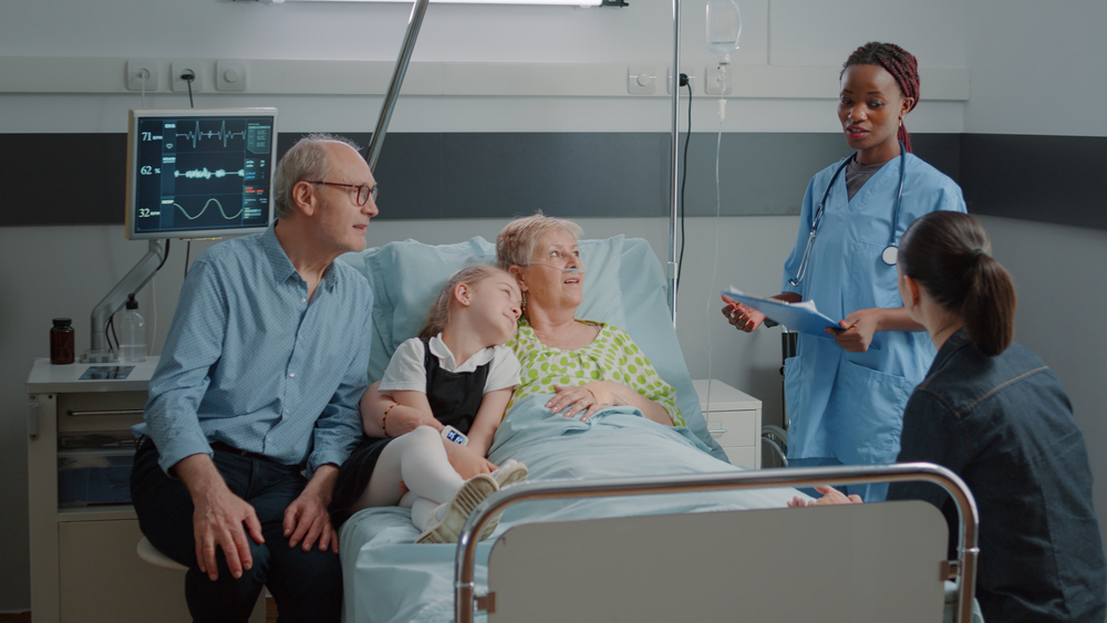 A family and care team in an emergency room.