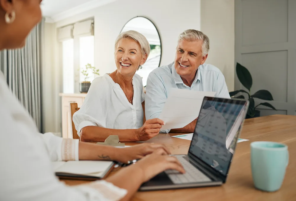 Depositphotos_614225304_S-1 A couple meeting with their concierge care management specialist in Herndon, VA