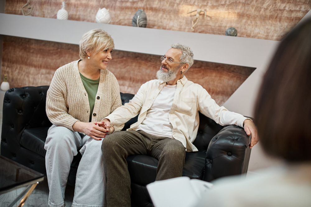 A couple meeting with their care manager for chronic illness.
