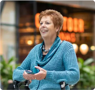 Mask-group-2 A happy senior woman who is pleased with her professional care management team in Herndon